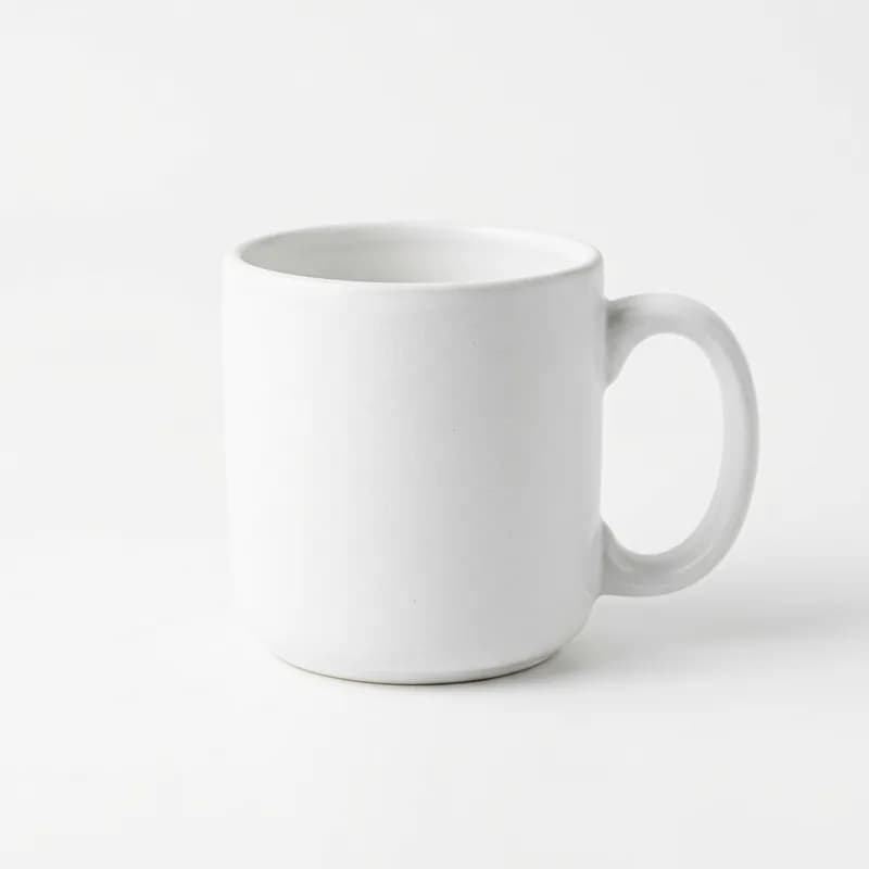 White ceramic mug on pure white background demonstrating Amazon main image requirements